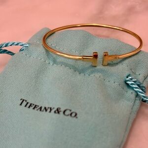 Tiffany T Narrow Wire Bracelet in Yellow Gold / T Wire Bracelet / Tiffany & Co.
